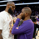 LeBron James #6 of the Los Angeles Lakers talks with Chris Paul #3 of the Phoenix Suns following the NBA game at Footprint Center on April 05, 2022 in Phoenix, Arizona. The Suns defeated the Lakers 121-110. (Photo by Christian Petersen/Getty Images)